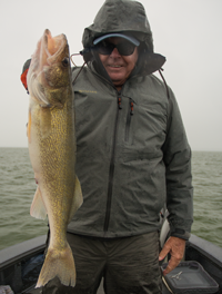 Paul Kautza with leech lake walleye