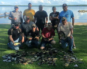 image of fishing group with large catch of Panfish