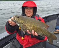 image of Penny Becker with smallmouth bass