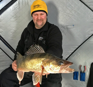 image of jon thelen with big walleye