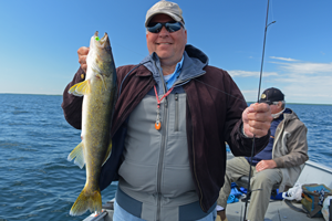 image of paul kautza with big walleye