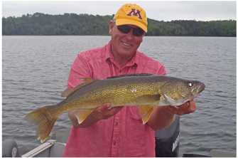 image of jeff sundin with big walleye