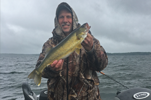 image of phil goettl with big walleye