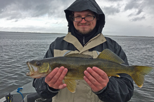 image of Tyler Johnston with big walleye