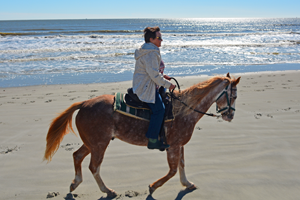 image of the hippie chick on horseback