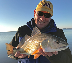 image of jeff sundin with nice redfish