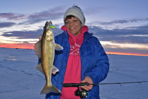 image of hippie chick with nice walleye