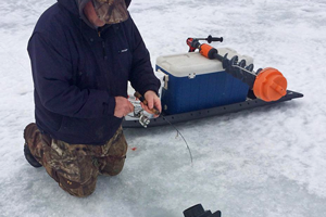 image of ice fisherman