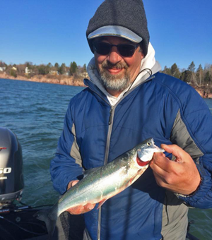 image of man with a trout