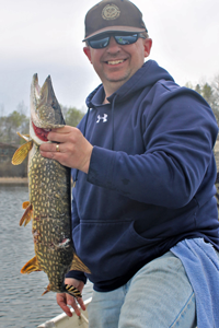 image of angler with northern pike