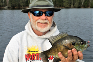 image of greg clusiau with big bluegill