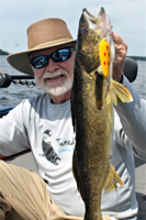 image of greg clusiau with big walleye