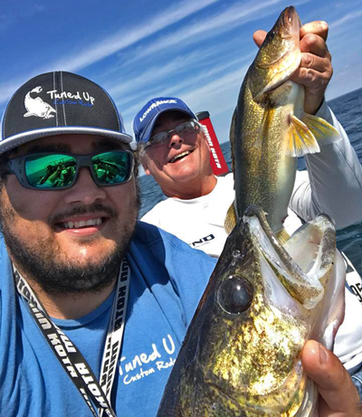 image of Andy Walsh with big mille lacs walleye