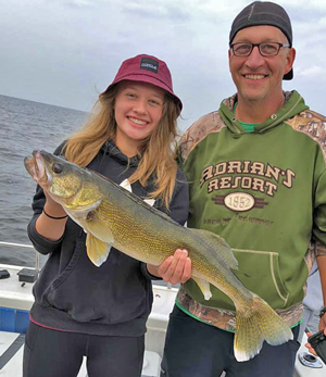 image of dave beyer holding big walleye