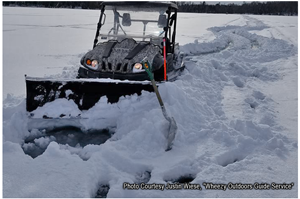 image of ATV stuck in slush