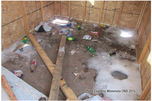 image of trashy ice fishing shelter