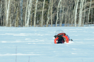 image of snowmobile stuck in snow