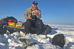 image of Jeff Sundin with walleye