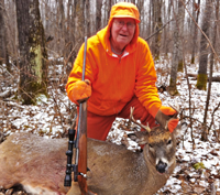 image of Harry Hagsten with Buck Deer