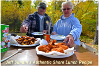 image of couple eating shore lunch