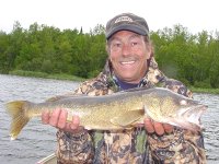 image of angler holding nice walleye